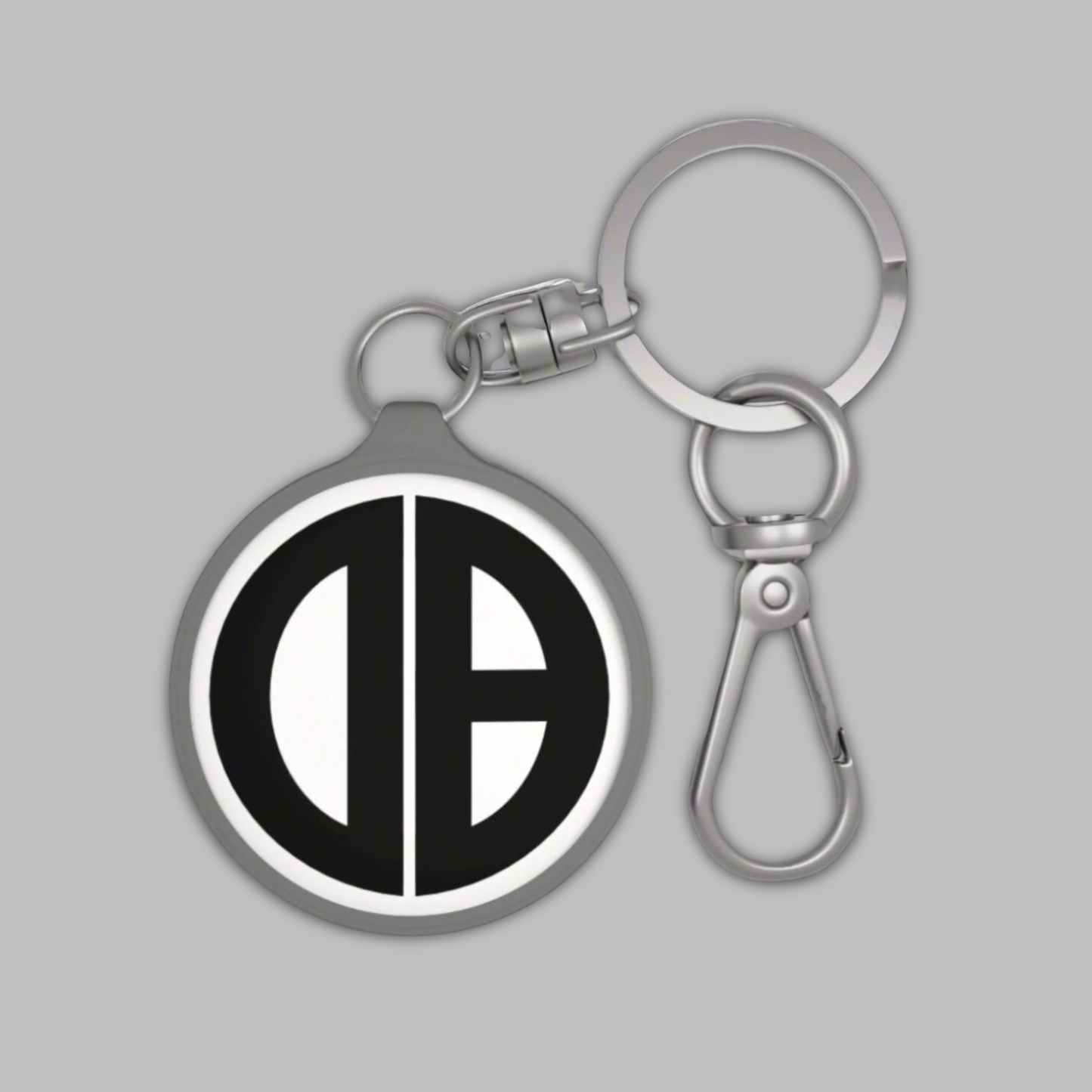 Front view of Black & White Circular logo design, Acrylic Keychain